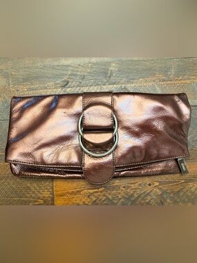 HOBO International Metallic Bronze Patent Leather Fold-over Buckle Clutch EUC